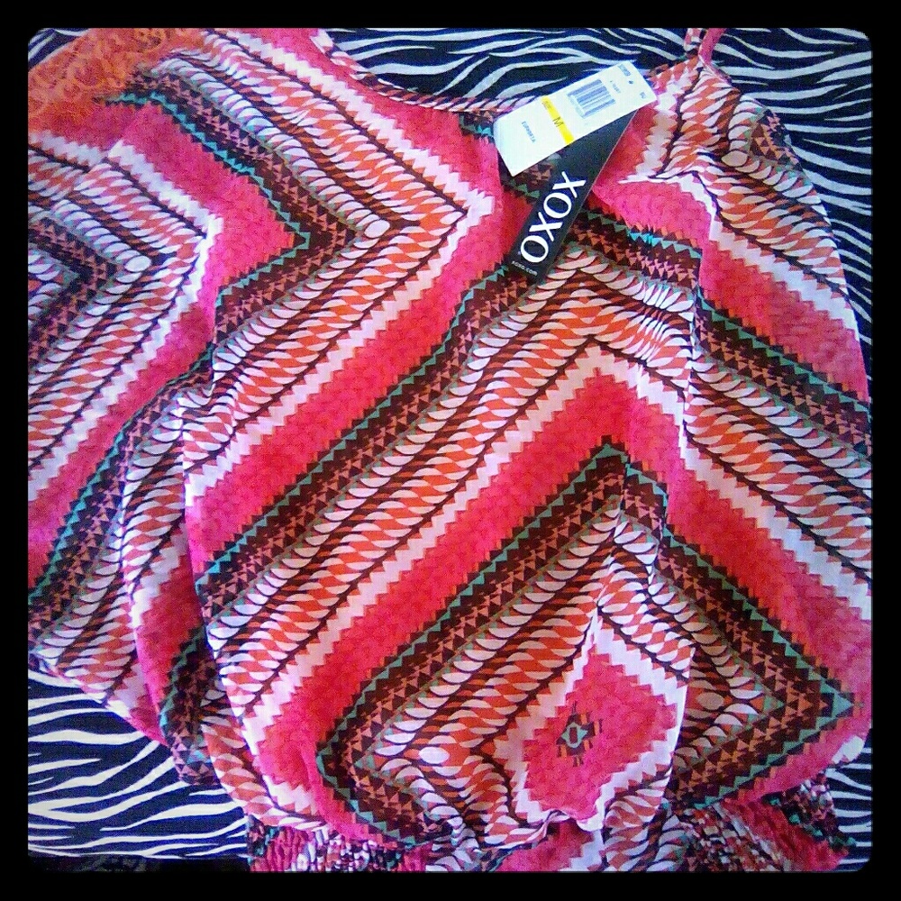 Flity peep shoulder xoxo blouse. Very sexy. Medium